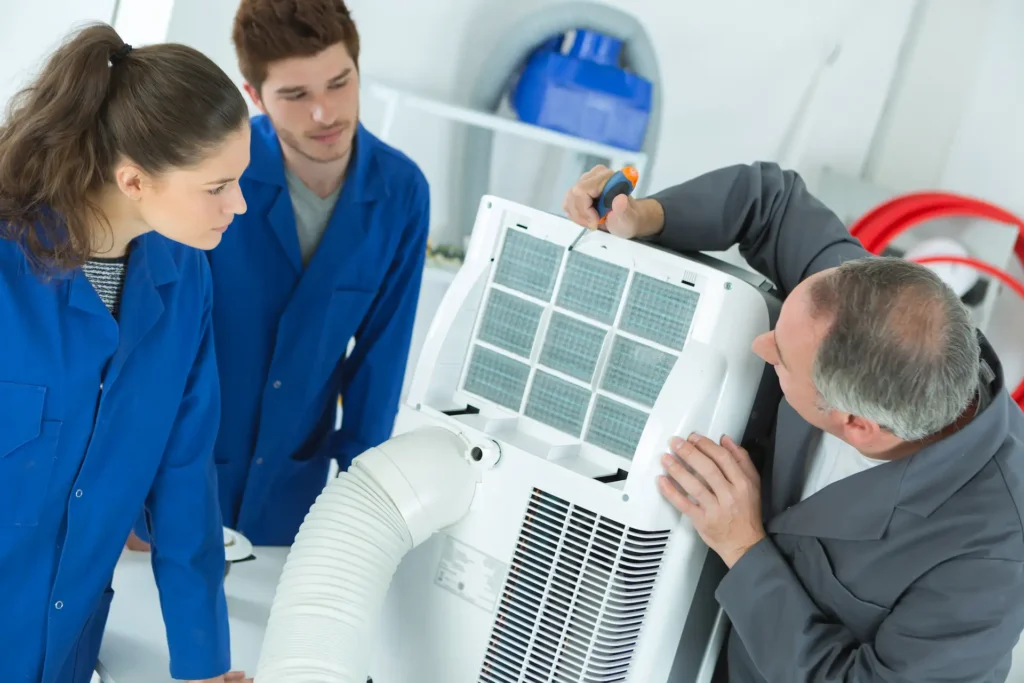 air cleaner being serviced by technician