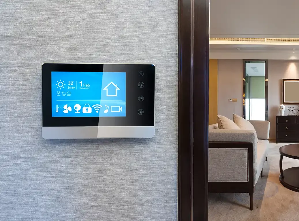 smart thermostat next to living room
